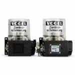 VOGEL KFA and KFAS centralized lubrication pumps shown side by side on a white background with transparent reservoirs and electronic control unit